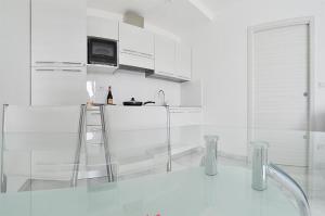 Kuchyň nebo kuchyňský kout v ubytování Mavip Residence