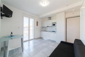 Kuchyň nebo kuchyňský kout v ubytování Mavip Residence
