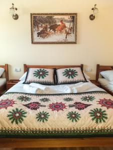 Кровать или кровати в номере Domek na wzgórzu