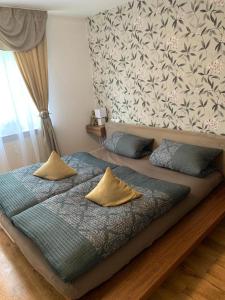 Кровать или кровати в номере Apartment Saxonia