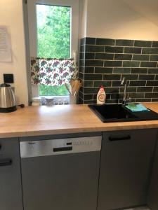 Kuchyňa alebo kuchynka v ubytovaní Apartament nad Śperką