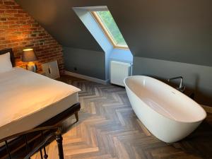 Posteľ alebo postele v izbe v ubytovaní Old Town Luxury Apartments Zgorzelec