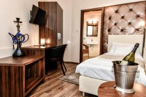Postel nebo postele na pokoji v ubytování Simbad Hotel & Bar Superior