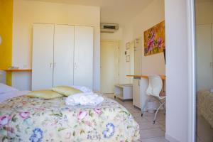Postel nebo postele na pokoji v ubytování Hotel del Sole