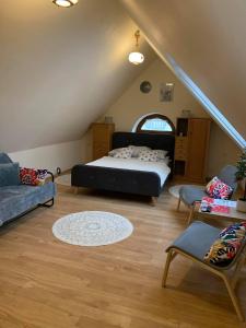 Кровать или кровати в номере Apartamenty w Ustroniu