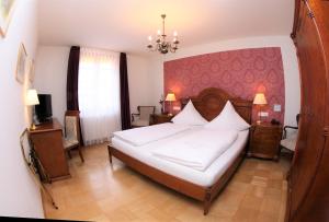 Cama o camas de una habitación en Hotel Rathausglöckel