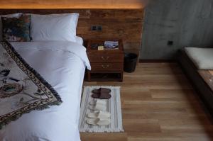 Una cama o camas en una habitación de 武当山太和紫隐酒店