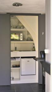 Virtuvė arba virtuvėlė apgyvendinimo įstaigoje BzonderB Callantsoog