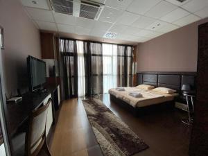 Postel nebo postele na pokoji v ubytování Hotel Fortuna