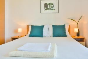 Postel nebo postele na pokoji v ubytování Holiday Apartments Soparin