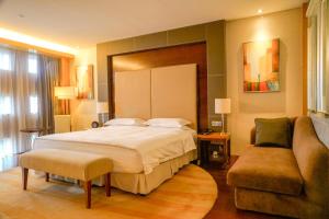Voodi või voodid majutusasutuse Hyatt Regency Dongguan toas