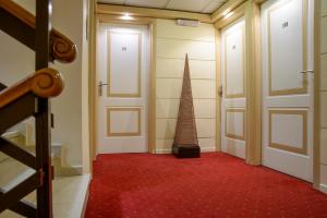 Posteľ alebo postele v izbe v ubytovaní Victory Inn Hotel