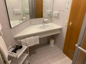 Koupelna v ubytování Hotel Hochfirst