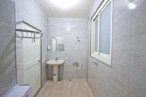 Koupelna v ubytování Dons Young Homestay + 37 fotografií