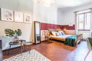 Krevet ili kreveti u jedinici u objektu Wine Apartments Florence Franciacorta