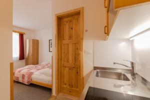 Postel nebo postele na pokoji v ubytování Apartments Rozle