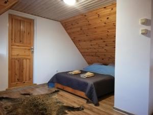 Postel nebo postele na pokoji v ubytování Miodunka