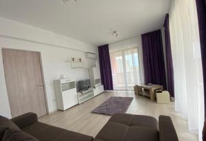Televisyen dan/atau pusat hiburan di Mario Building Apartments