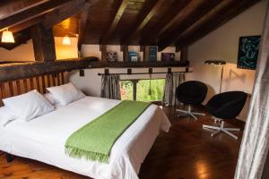 En eller flere senge i et værelse på El Rincón de Doña Urraca