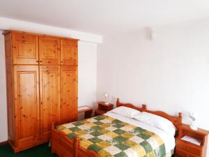 Postel nebo postele na pokoji v ubytování Albergo Trieste
