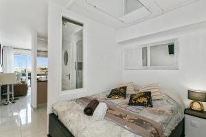 a bedroom with a bed in a room at L'After Port Nature in Cap d'Agde