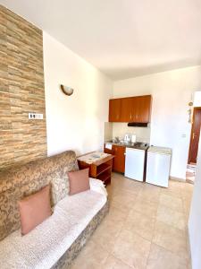 Kuchyň nebo kuchyňský kout v ubytování Apartments Aga