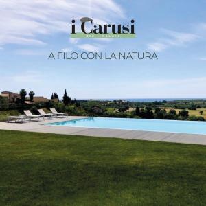 een citaat over een villa met zwembad bij I Carusi Relais in Noto