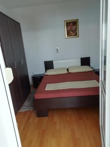 Postel nebo postele na pokoji v ubytování APARTMAN ZVONIMIR