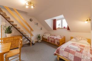 Postel nebo postele na pokoji v ubytování Apartments Rozle