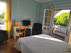 Кровать или кровати в номере Hotel Marisma Sancti Petri