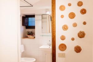 Koupelna v ubytování B&B Borgo di Oliveto - Appartamenti con Cucina + 37 fotografií
