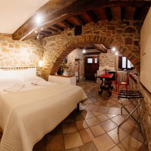 Postel nebo postele na pokoji v ubytování B&B Borgo di Oliveto - Appartamenti con Cucina