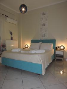 Postel nebo postele na pokoji v ubytování Sweet Suites