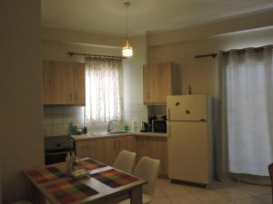 Kuchyň nebo kuchyňský kout v ubytování Sweet Suites