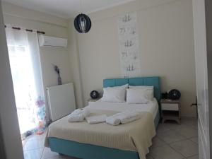 Postel nebo postele na pokoji v ubytování Sweet Suites