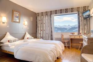 Letto o letti in una camera di Hotel Ad'Eldorado