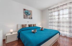 Posteľ alebo postele v izbe v ubytovaní Holiday House Vita + 23 fotografií