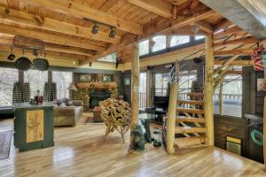 a large living room with a wooden ceiling at Dancing Dragonfly 26 in Sevierville