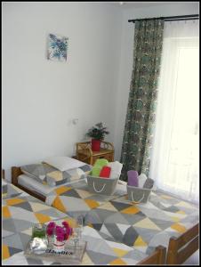 Posteľ alebo postele v izbe v ubytovaní Apartman Antea Hvar