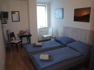 Letto o letti in una camera di BAILANDO Studio
