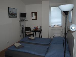 A bed or beds in a room at BAILANDO Studio