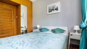 Posteľ alebo postele v izbe v ubytovaní Aquarius Sopot - BillBerry Apartments