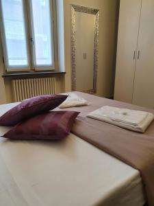 מיטה או מיטות בחדר ב-Residenza Venturini