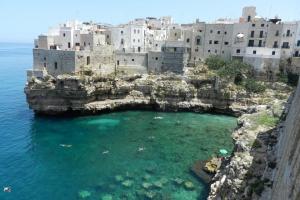 an island in the ocean with a group of buildings at Casa Vacanze TITINA HOME in Montalbano