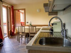 Kuchyň nebo kuchyňský kout v ubytování Residence Pedranzini