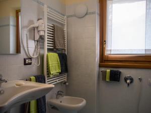Koupelna v ubytování Residence Pedranzini + 37 fotografií