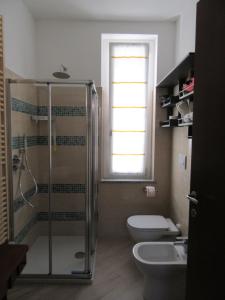 Koupelna v ubytování Un letto nel cortile + 26 fotografií