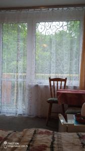 Posezení v ubytování pokoje STIFADO + 18 fotografií