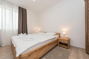 Postel nebo postele na pokoji v ubytování VILLA PETAR'S DREAM 3