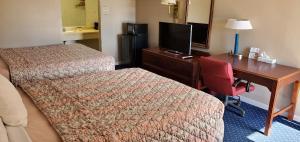 TV a/nebo společenská místnost v ubytování Brooks Motel